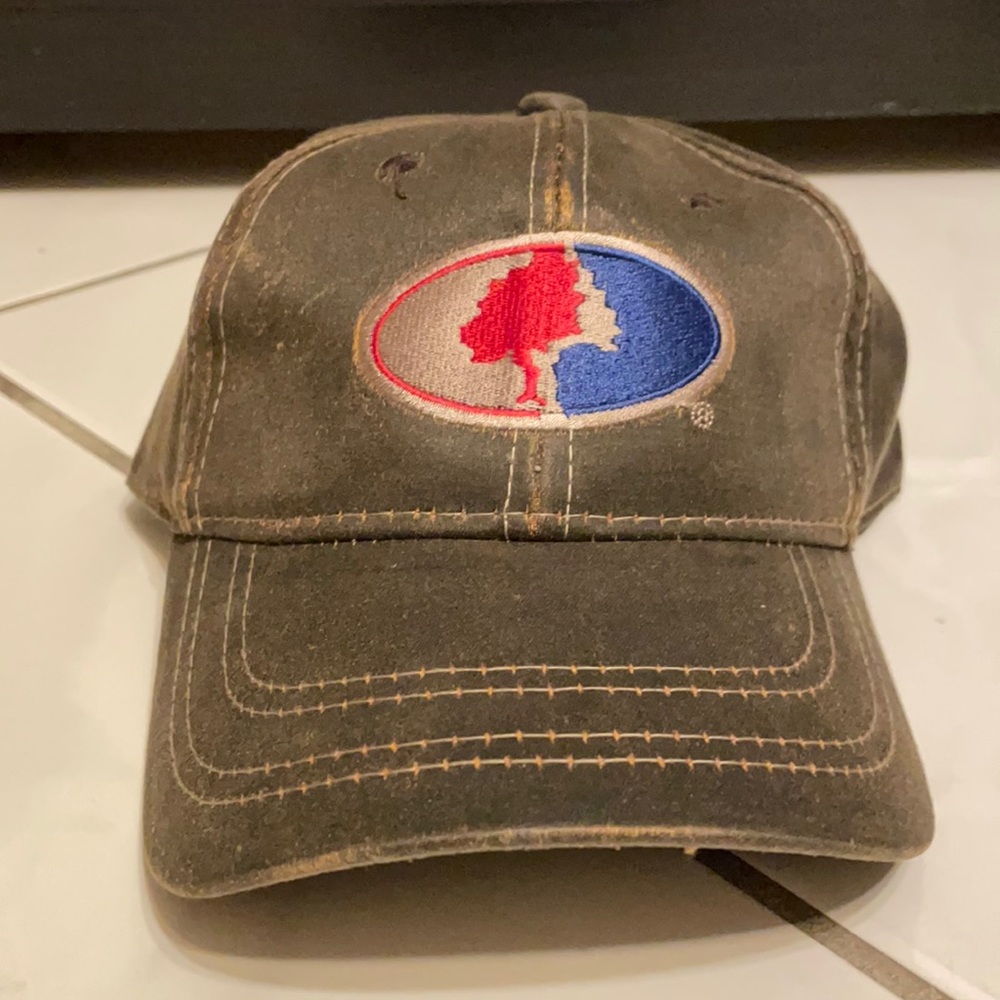 Mossy oak cap in perfect condition almost new in leather